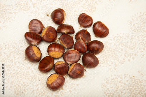 A small pile of chestnuts, conkers isolated 