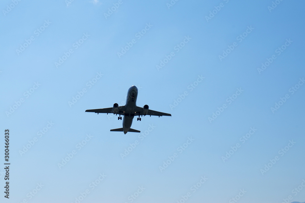 Airplane take off at airport. Passenger plane fly up over take-off runway from airport. Airplane take off at airport. Passenger plane fly up over take-off runway from airport.