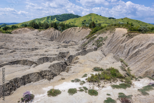 Berca Mud Volcanoes area near Scortoasa village in Romania photo