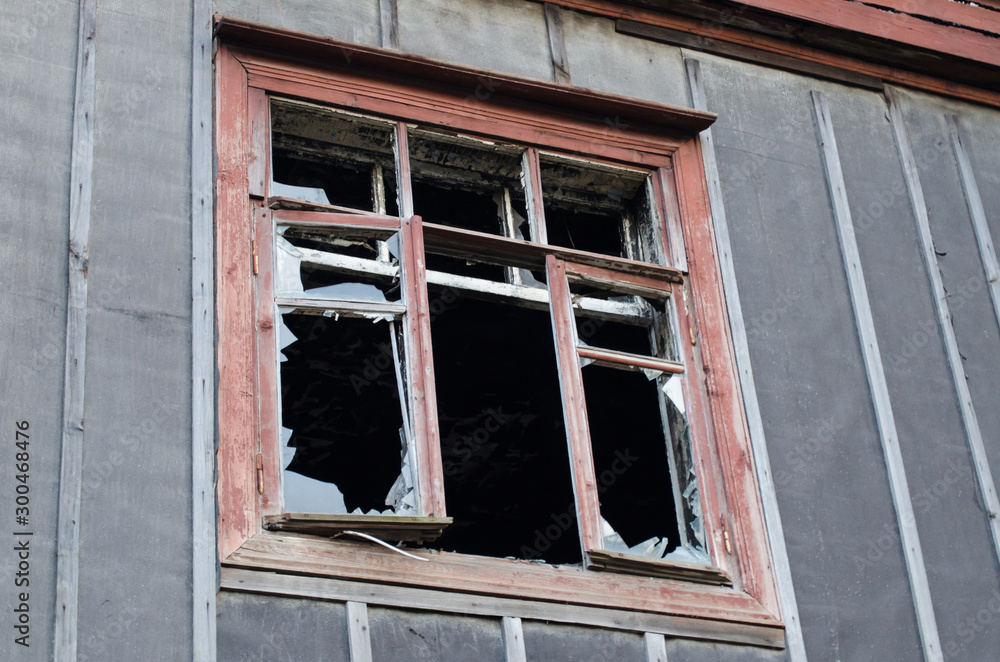 Window barracks with broken glass after a gas explosion and fire.