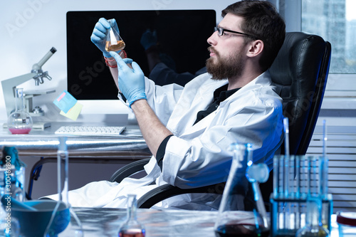 Scientist conducting experi...