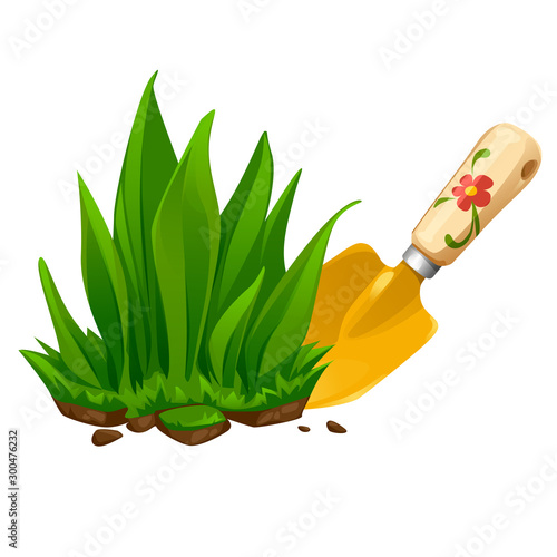 vector garden shovel with a piece of soil and grass