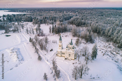 Saint Petersburg. Russia. Leningrad region. View from the height of the Church and trees. Winter in Russia. Russian churches. Orthodoxy. Religious building. Winter landscape. © Grispb
