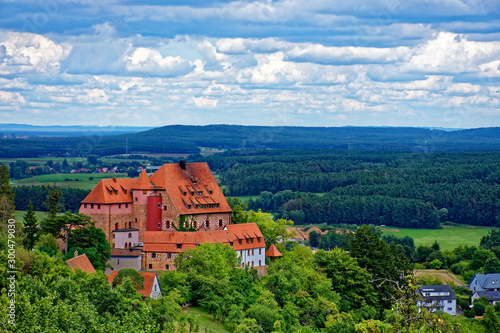 Beautiful sky with clouds over the ancient castle Burg Wernfels