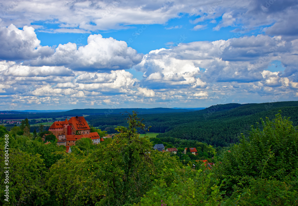 Beautiful sky with clouds over the ancient castle Burg Wernfels Beautiful sky with clouds over the ancient castle Burg Wernfels