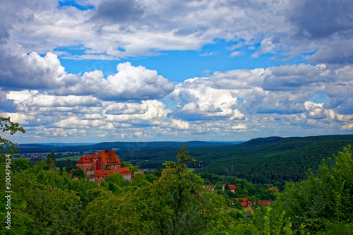 Beautiful sky with clouds over the ancient castle Burg Wernfels