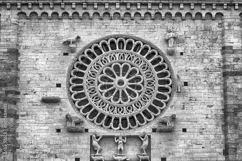 Rose window of the medieval Cathedral of Assisi, Italy