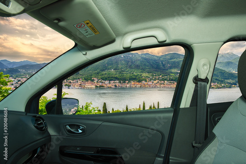 Car window with view of Salo town, Lake Garda, Italy