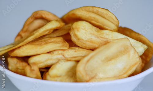 Jackfruit chips on white background.