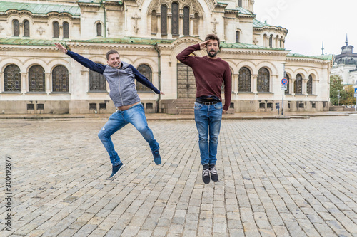 Two crazy men jumping on the streets of Sofia. bulgaria