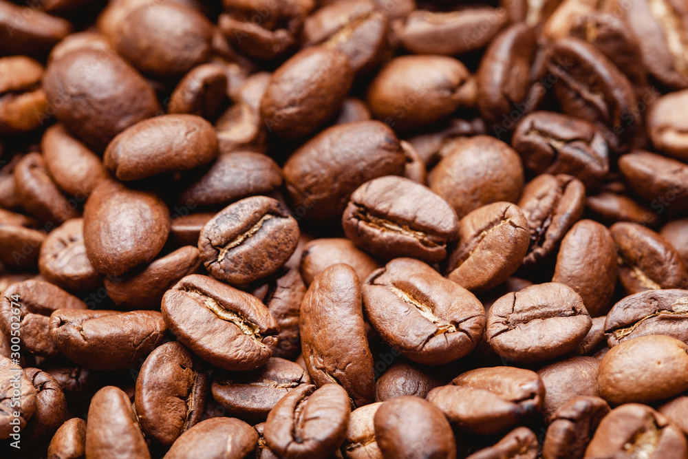 Coffee beans texture. Morning energy roasted brown beans background. Coffee beans texture. Morning energy roasted brown beans background.