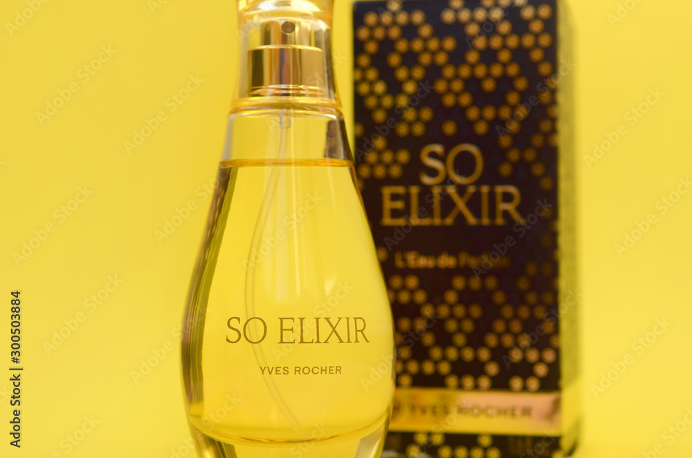 KHARKOV, UKRAINE - OCTOBER 21, 2019: Bottle of So Elixir perfume by Yves  Rocher on bright yellow color background Stock Photo | Adobe Stock