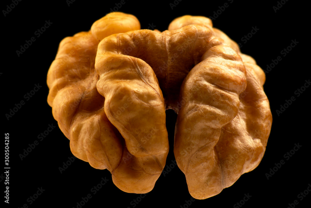 walnut closeup on a black background walnut closeup on a black background