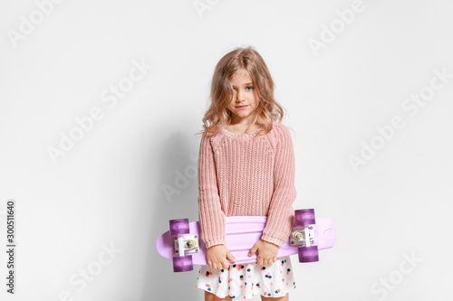 Cute little girl with skate...