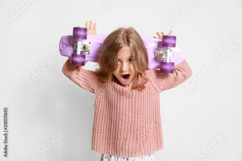 Surprised little girl with ...