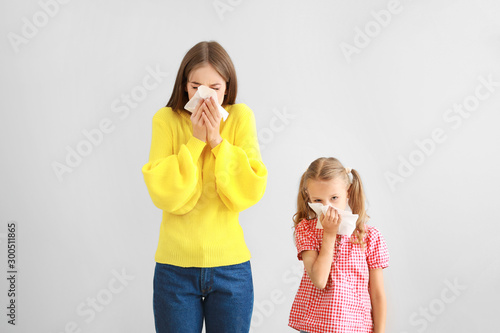 Young woman and girl suffer...