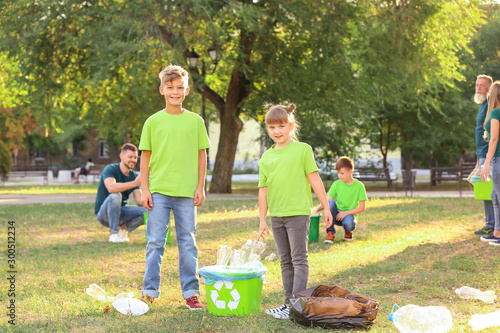 People gathering garbage ou...