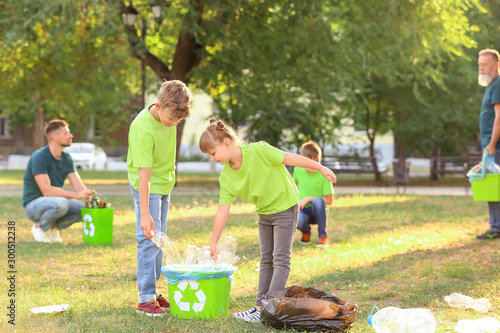 People gathering garbage ou...