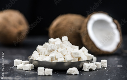 Portion of healthy Coconut dices (selective focus; close-up shot)