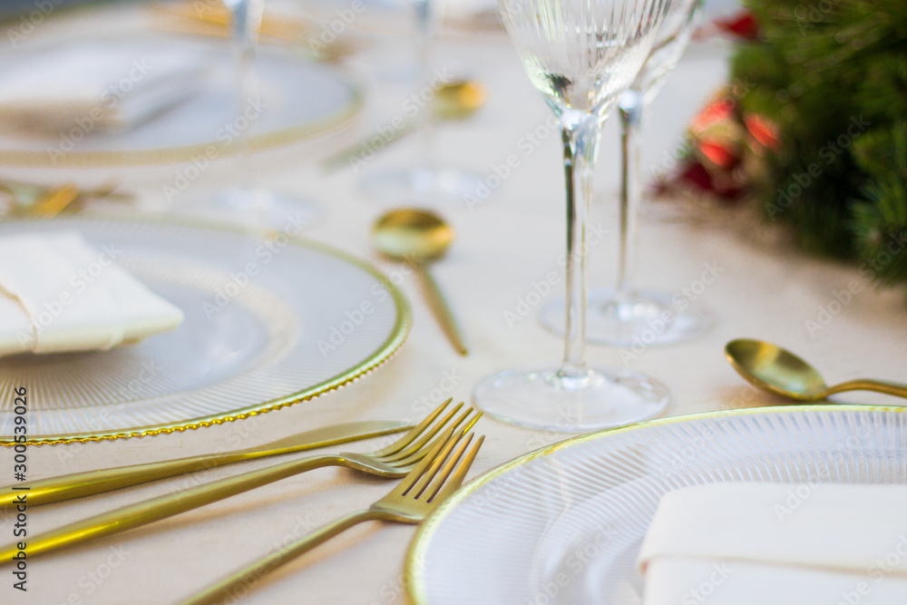 Christmas table on a exterior yard, with gold setup. Christmas table on a exterior yard, with gold setup.