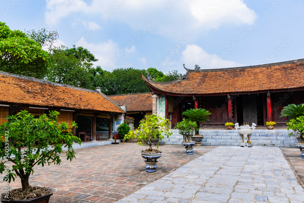 Fototapeta premium Scenery of Thuong shrine in ancient Co Loa citadel, Vietnam. Co Loa was capital of Au Lac (old Vietnam), the country was founded by Thuc Phan about 2nd century BC.