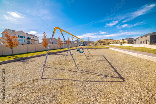 Set of A-frame kids swings in a residential park