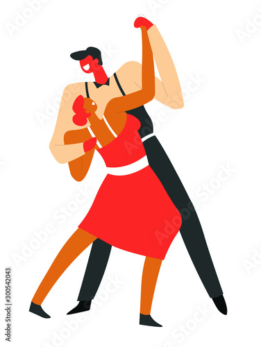 Couple dancing tango and performing on dancefloor at competition