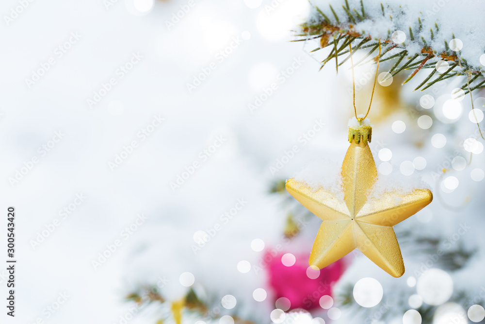 Christmas tree in snow background. New Year composition with fir tree, balls and lights and bokeh. - obrazy, fototapety, plakaty 