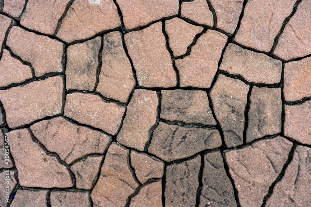 Stone background lined up,Brown stones arranged Stone background lined up,Brown stones arranged
