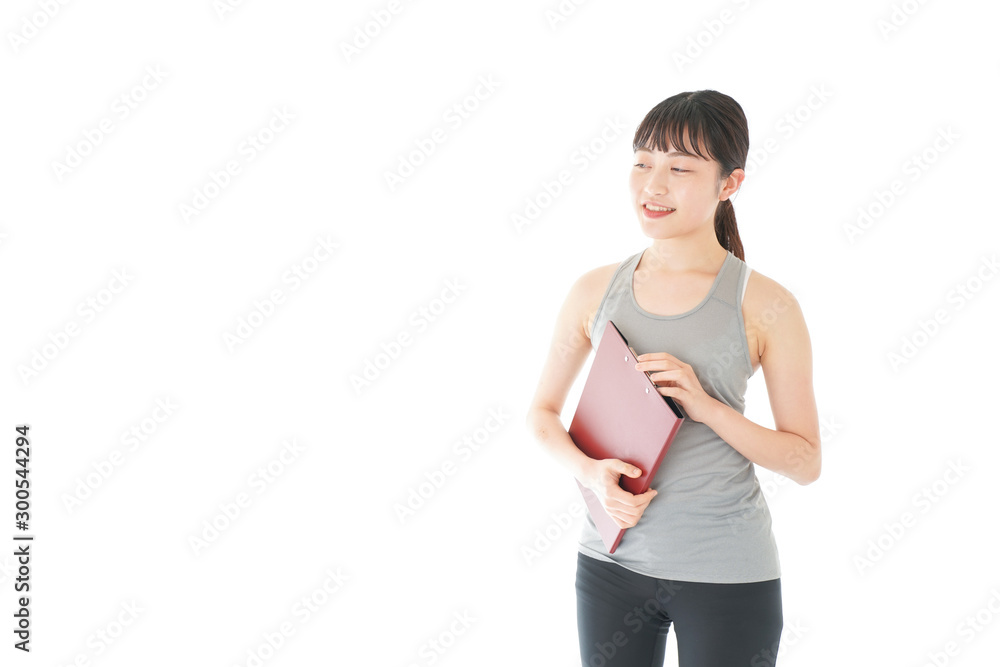 スポーツウェアを着た若い女性 スポーツウェアを着た若い女性