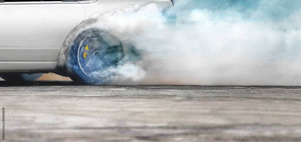 Race drift car burning tires on speed track - obrazy, fototapety, plakaty 
