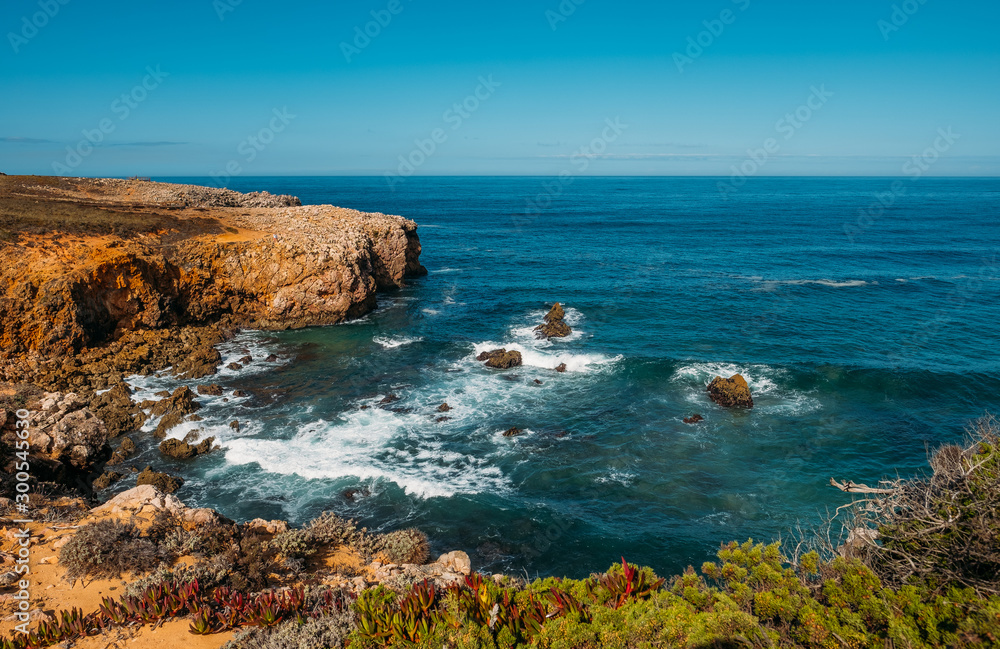 Ocean waves. Scenic bay and rocks Ocean waves. Scenic bay and rocks