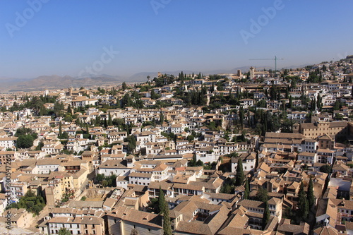 Aerial view of the Albaicin city taken from Tower of the Cubo (Cube Tower) of the historical Alhambra Palace complex in Granada, Andalusia, Spain.