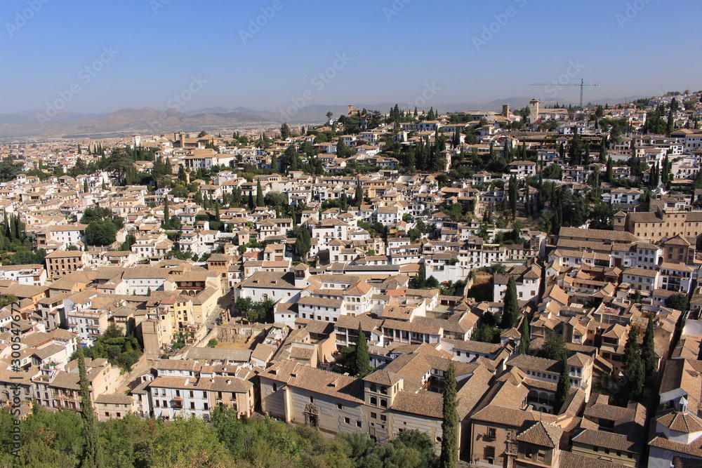 Aerial view of the Albaicin city taken from Tower of the Cubo (Cube Tower) of the historical Alhambra Palace complex in Granada, Andalusia, Spain.