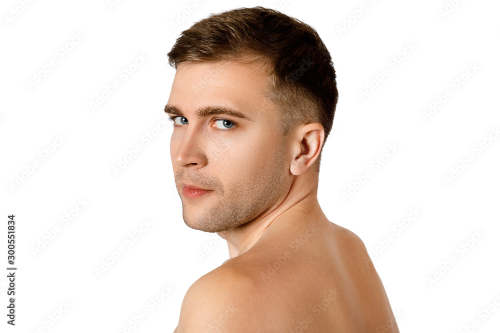 Fototapeta premium Young adult man of Caucasian appearance over white