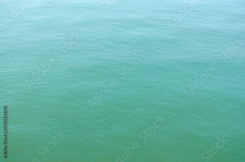 Calm green-blue water background texture