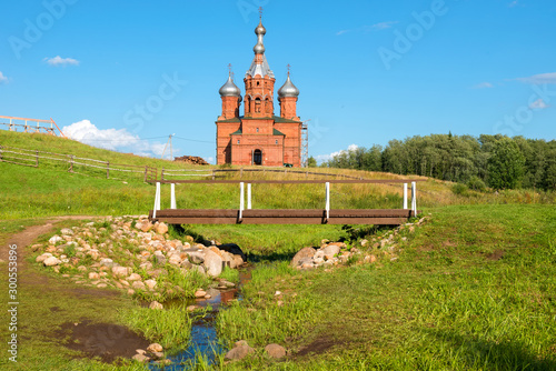 The first bridge over the source of the Volga River. Volgoverkhovye Olginsky convent, Church Transfiguration in Tver Region, Russia photo