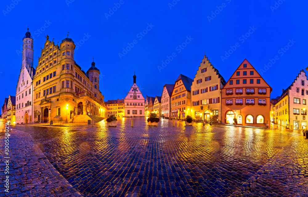 Main square (Marktplatz or Market square) of medieval German town of Rothenburg ob der Tauber evening panoramic view.