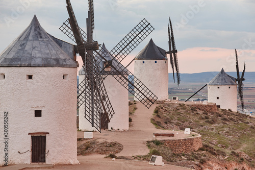 Traditional antique windmills at sunset in Spain. Consuegra, Toledo