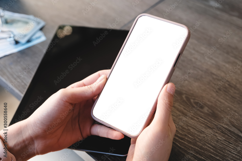 Close up of woman using cell phone,sending massages on the garden.having sunbath.Phone with black screen,texting,video calls, Close up of woman using cell phone,sending massages on the garden.having sunbath.Phone with black screen,texting,video calls,