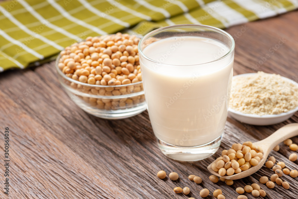 Homemade Soy milk and Soybean with Soy flour on wooden background, Healthy drink. Homemade Soy milk and Soybean with Soy flour on wooden background, Healthy drink.