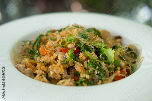 Stir fried vermicelli with minced pork and Cha-om leave