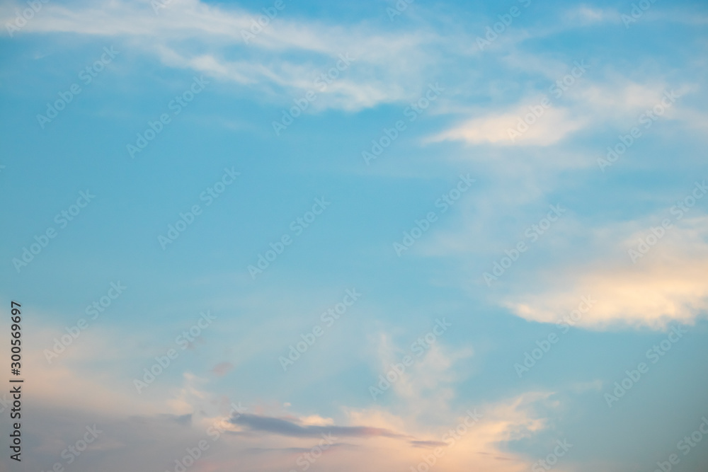Abstract blurred background Blue sky with white clouds in sunlight. Abstract blurred background Blue sky with white clouds in sunlight.