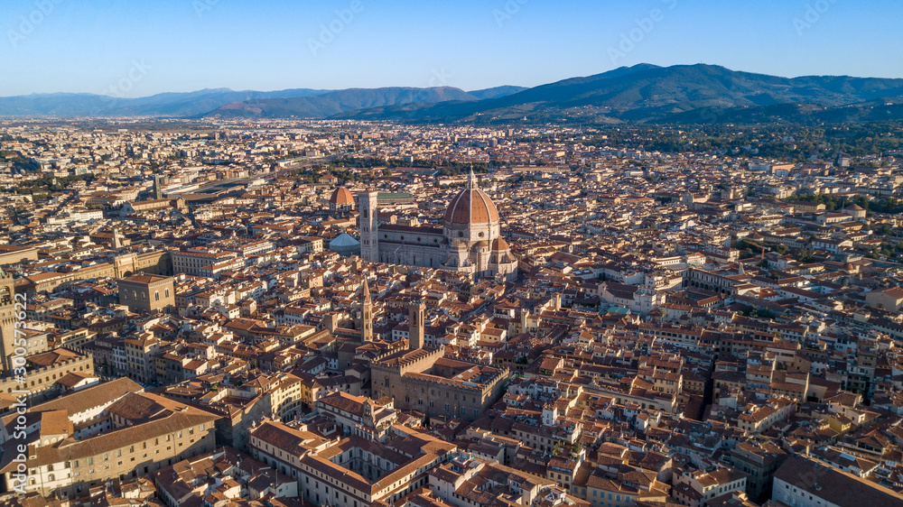 Aerial drone shot view of Florence with main attractions in the morning sunlight