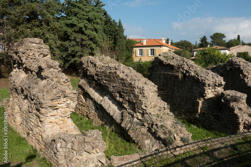 ruins of the arenes of the city of Frejus, resort city on the Cote d'Azur in France photo