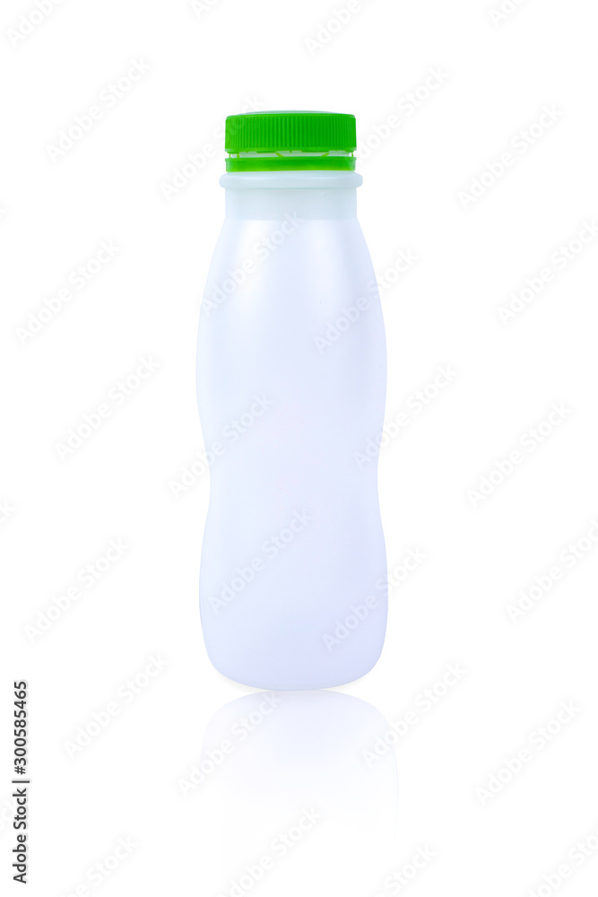 Fresh milk packaging bottles with green lids on a white background. Fresh milk packaging bottles with green lids on a white background.