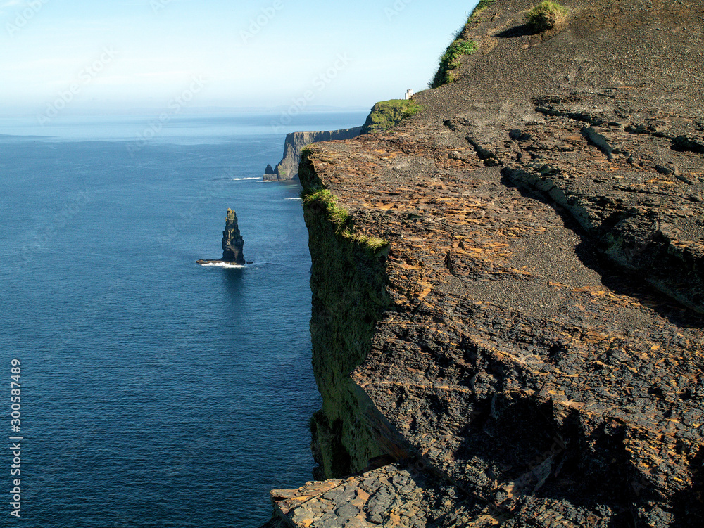Cliff of Moher, county Clare, Ireland. Rock formation, Atlantic ocean, Sunny warm day. Part of Wild Atlantic Way experience.