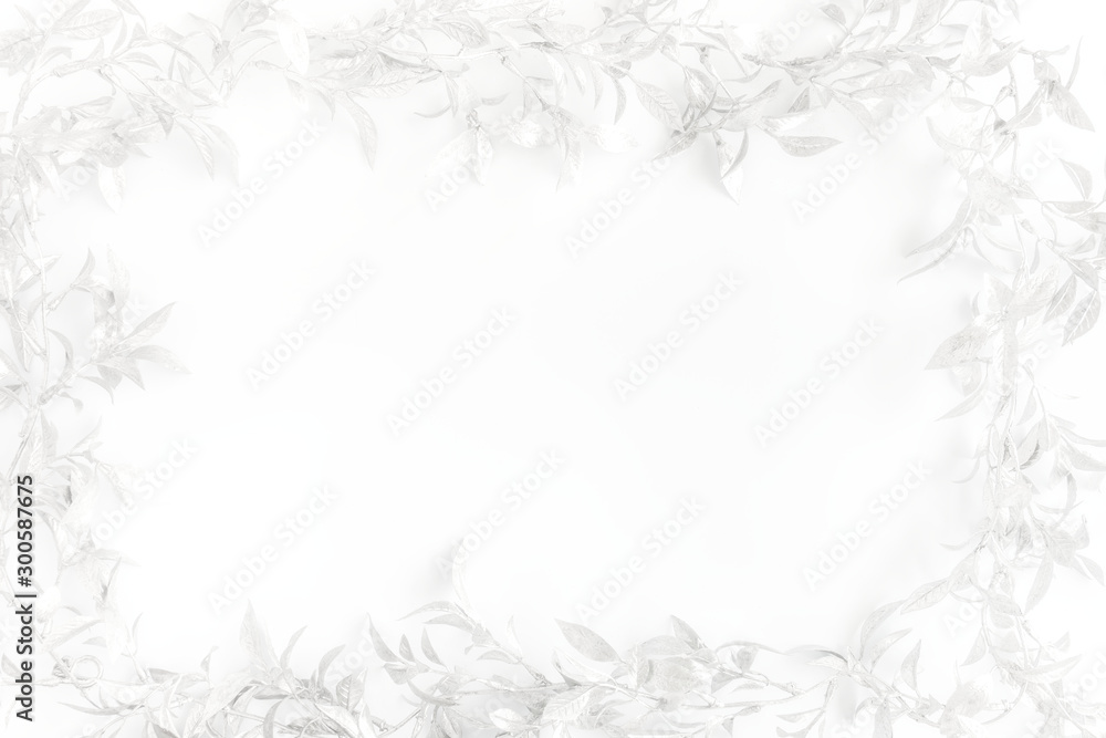 Christmas Frame with Silver Leaves on White Background Christmas Frame with Silver Leaves on White Background