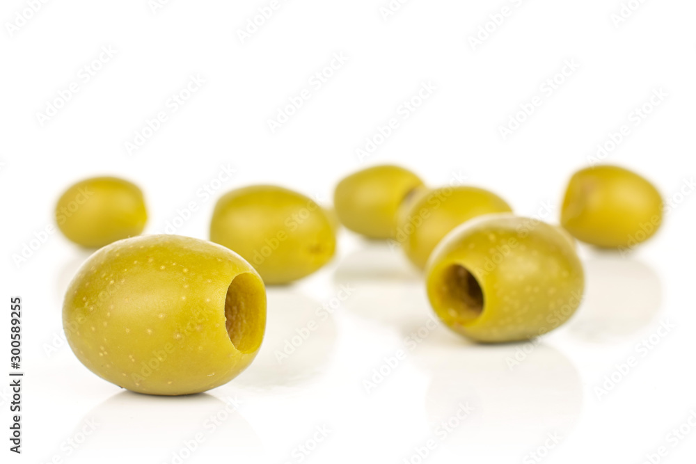 Lot of whole pitted green olive isolated on white background Lot of whole pitted green olive isolated on white background
