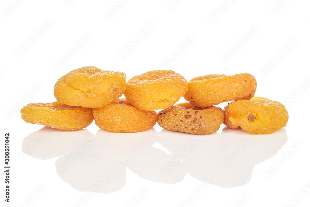Group of seven whole dried orange apricot isolated on white background Group of seven whole dried orange apricot isolated on white background